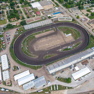 An overhead view of a full racetrack. 